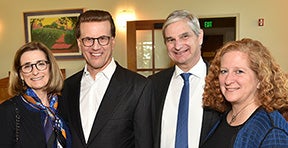 Nina Zolt, professor Zolt’s sister, with Lowell Milken ’73, Zolt and Dean Jennifer Mnookin.